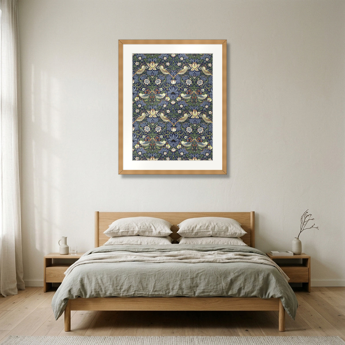 Strawberry Thief (1883) – William Morris framed in natural oak in a Nordic bedroom