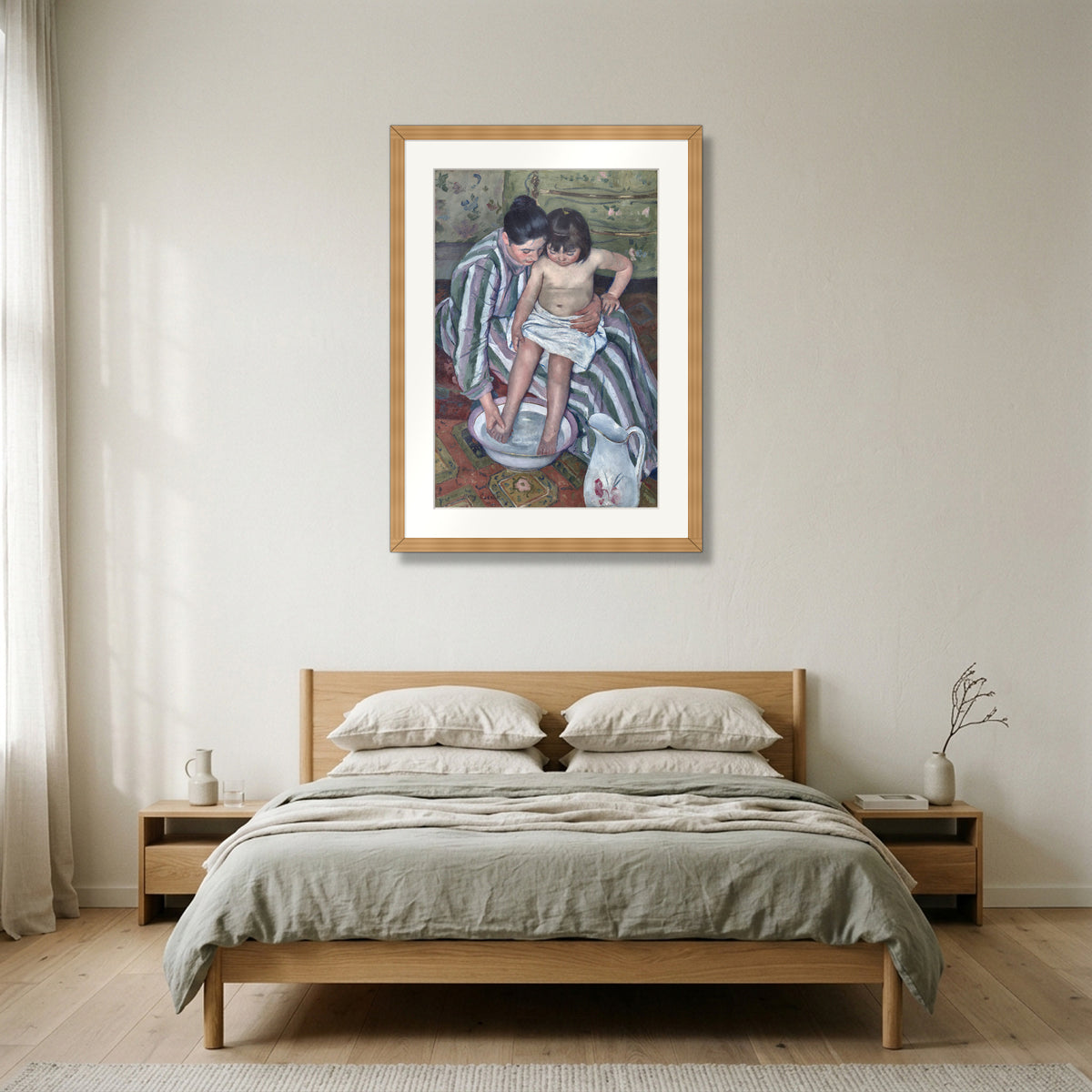 The Child's Bath (1893) – Mary Cassatt framed in natural oak in a Nordic bedroom