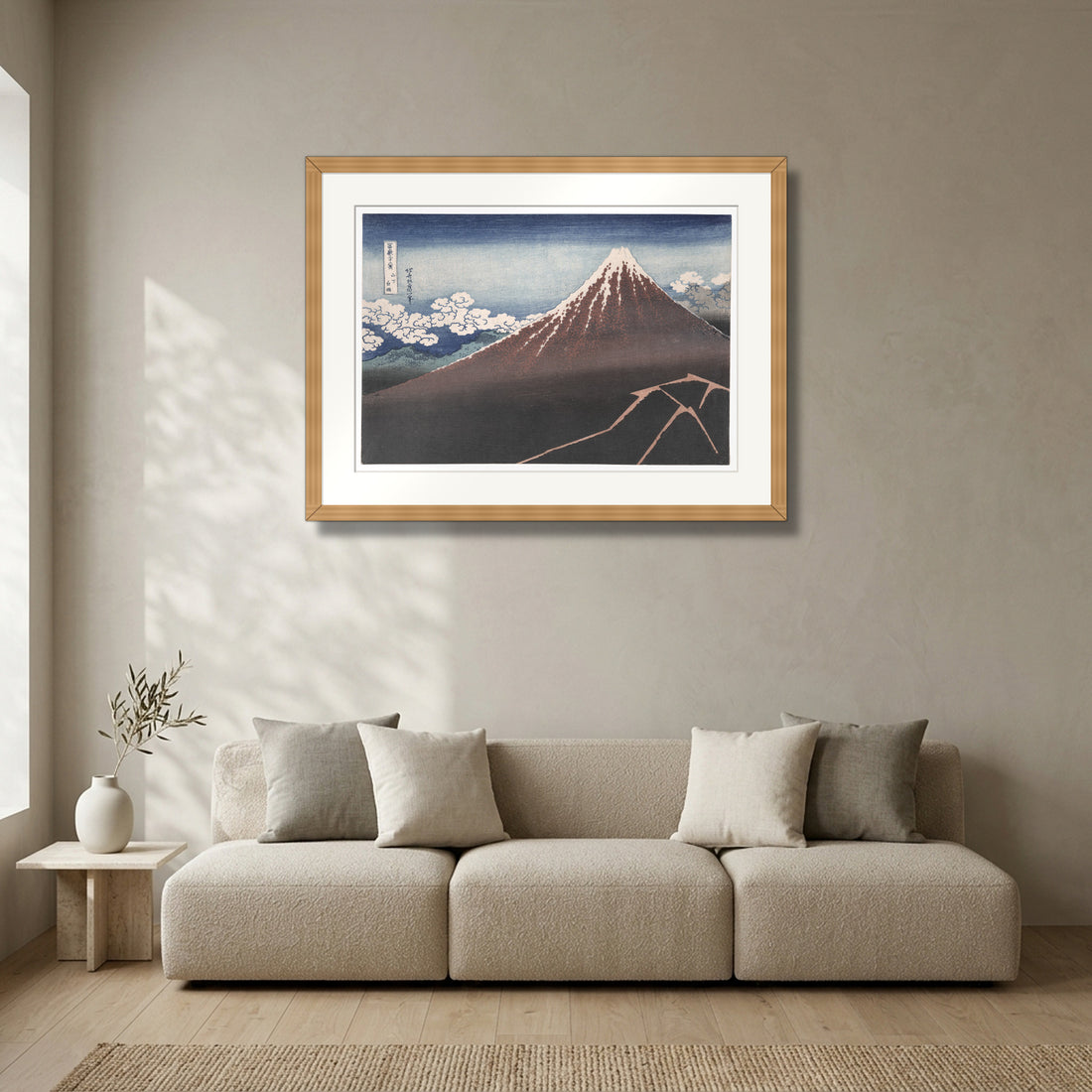 Shower Below the Summit (c. 1830–33) – Katsushika Hokusai framed in solid natural oak in a modern living room