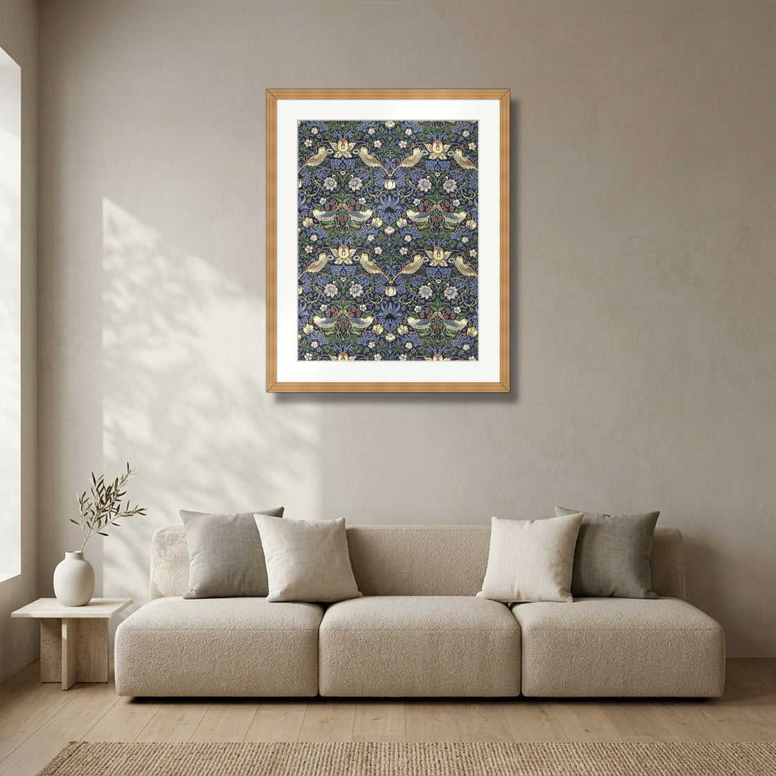 Strawberry Thief (1883) – William Morris framed in solid natural oak in a modern living room