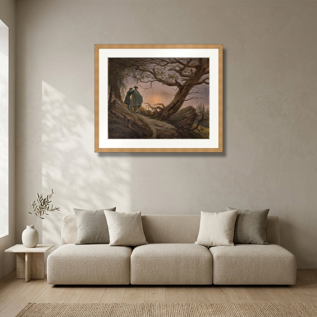 Two Men Contemplating the Moon (c. 1825–30) – Caspar David Friedrich framed in solid natural oak in a modern living room